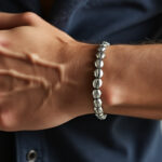 découvrez les avantages uniques d'un bracelet graine de café en argent pour homme : élégance, originalité et symbolisme naturel pour un style authentique.